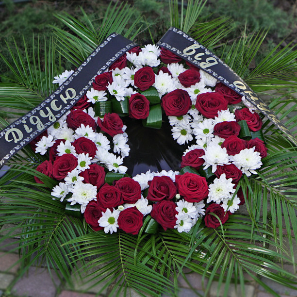 Funeral wreath with red roses buy with delivery