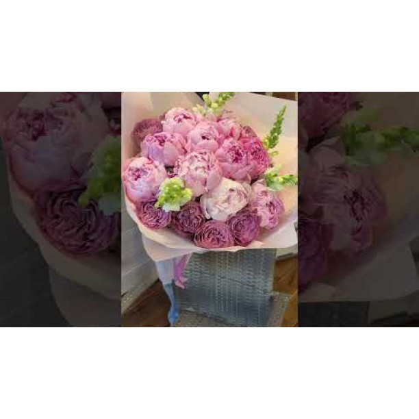 A large bouquet of peonies and Caprice roses made to order